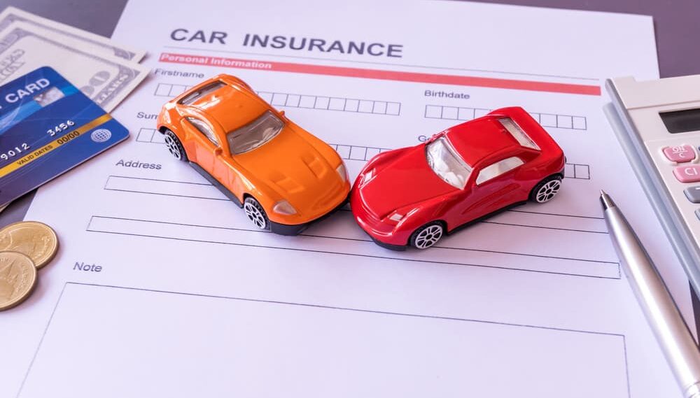 This image shows car insurance application including a model and a policy document.