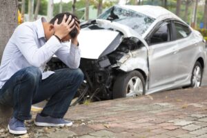 Driver feeling pain driver after a dangerous traffic accident of car. 