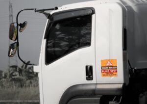 Blind spot sticker on vehicle.