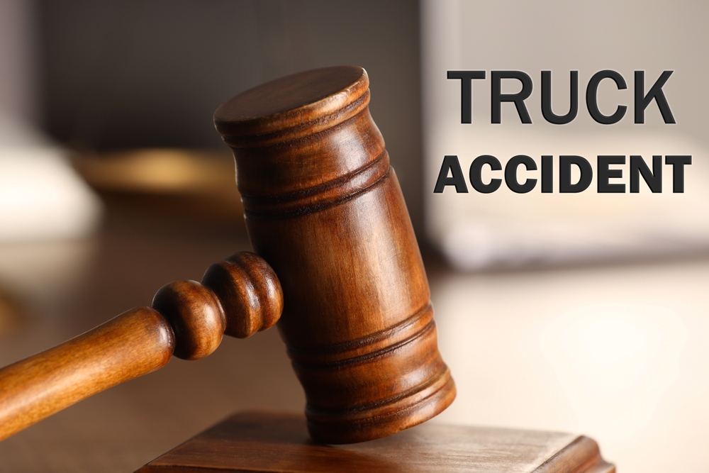 Truck accident law. Judge's gavel on table