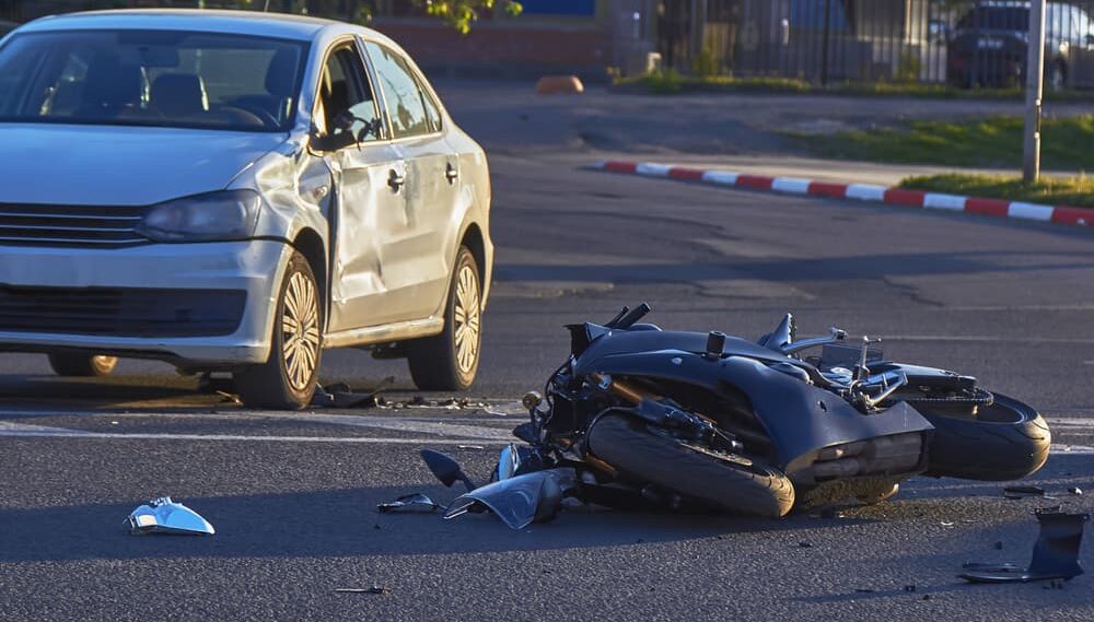 a motorbike crashed into a car